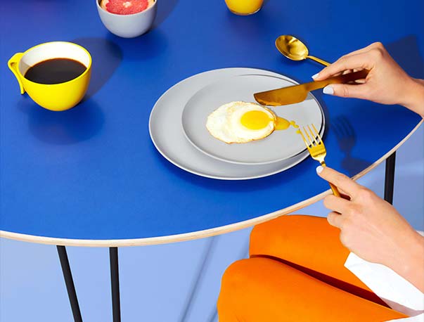 Person Eating with Juice and Coffee Person eating with juice and coffee